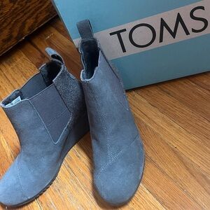 TOMS bootie wedged heel, in LIKE NEW & perfect condition. NEVER worn. Size 7 W